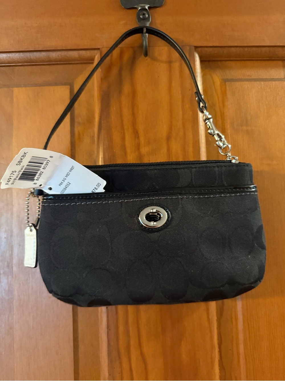 Coach Black Signature Wristlet with Silver Turnlock